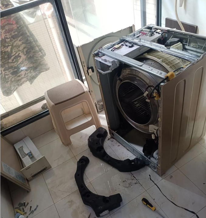 How to remove the dirt tank from a drum washing machine